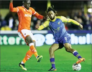  ?? PICTURE: PA ?? CUP TRICK: Solihull’s Jamie Reckford takes on Donervon Daniels