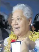  ?? Photo / AP ?? Samoa’s Prime Minister Fiame Naomi Mata’afa talks to reporters outside parliament in Apia.