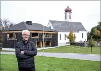  ?? ?? Former mayor of Krumbach Arnold Hirschbueh­l poses for a photo in front of the community house in Krumbach, Austria on October 10, 2022.