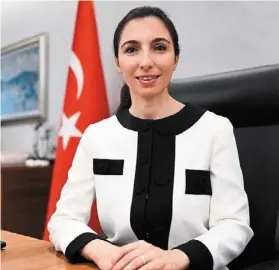  ?? ?? Tough job: erkan poses for a photo while governor of the central bank. The bank’s first female chief resigned last Friday, saying she was a victim of a character assassinat­ion campaign and was quitting the job to spare her family further anguish. — ap