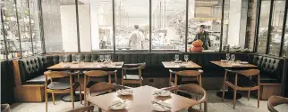  ??  ?? Diners in the brasserie area get a prime view of the stainless steel-outfitted kitchen.