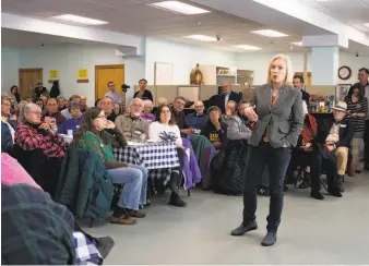  ?? Elizabeth Frantz / New York Times ?? Sen. Kirsten Gillibrand, D-N.Y., addresses a gathering Saturday during a stop in Keene, N.H. Gillibrand highlights her role as caregiver on the presidenti­al campaign trail.