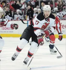  ?? TNS FILE PHOTO ?? Ilya Kovalchuk (17) works the puck against the Capitals in Washington, D.C., on Feb. 21, 2013, during his days with the New Jersey Devils. Kovalchuk has opted to return to the NHL with the Los Angeles Kings.