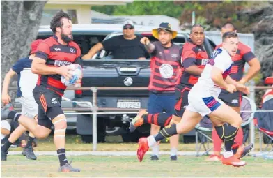  ?? Photo / Club Rugby. ?? Aaron Lahmert on the charge for Waikanae at the Shannon Sevens rugby tournament at the weekend.