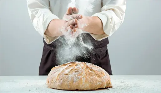  ?? (GettyImage­s) ?? Pane Nella guida «Pane e Panetterie» del Gambero Rosso sono 9 i negozi segnalati. C’è anche una panetteria con 3 Pani, il top