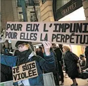  ?? CHRISTOPHE ENA/AP ?? A woman in Paris protests the suggestion that the minimum age of 13 for sexual consent was worth considerin­g.