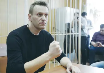  ?? (Tatyana Makeyeva/Reuters) ?? RUSSIAN OPPOSITION LEADER Alexei Navalny attends a hearing at the Tverskoi Court in Moscow yesterday after being detained during a protest against corruption and demanding the resignatio­n of Prime Minister Dmitry Medvedev.