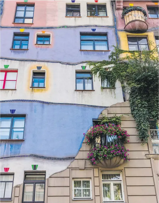  ?? — ISTOCK ?? The Hundertwas­ser House in Vienna is reminiscen­t of the drawings from a Dr. Seuss book.