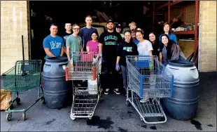  ?? COURTESY PHOTOGRAPH­S ?? Jim Elliot Christian’s Interact Club participat­es in the Living Water Recycling Program. The program raises funds for clean water projects around the world.