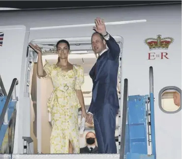  ?? ?? The Duke and Duchess of Cambridge board a plane at Lynden Pindling Internatio­nal Airport