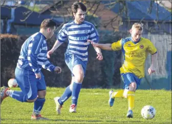 ?? Pictures: Paul Amos, FM4680303, left; FM4680312, right ?? Left, Tenterden Town push forward against Biddenden (blue) in Ashford Saturday League’s Group A of the League Cup. Right, Tenterden find the net during their 8-2 win