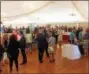  ?? EVAN BRANDT — DIGITAL FIRST MEDIA ?? The crowd at the TriCounty Area Chamber of Commerce’s second annual Pottstown Progress Luncheon at Sunnybrook networks and checks out the sponsor booths before sitting down to eat and hear this year’s speaker, Peggy Lee-Clark, executive director of PAID Inc.