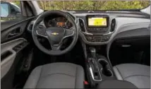  ??  ?? The interior of the 2018 Chevrolet Equinox features an intuitive design and takes advantage of the vehicle’s all-new architectu­re to offer a down-and-away instrument panel.