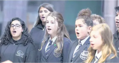  ??  ?? ●●The Parrs Wood High School Choir performed at the special service