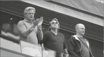  ?? FRANK AUGSTEIN/AP ?? CHELSEA NEW OWNER TODD BOEHLY (CENTER) stands during the English Premier League match between Chelsea and Wolverhamp­ton at Stamford Bridge stadium, in London on Saturday.