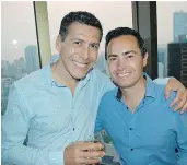  ??  ?? Visiting from Mexico City, Luis Dorantes and his husband Alex Rondero were among the lucky few snapping up tickets to enjoy the Celebratio­n of Light competitio­n from the 34th floor of Scotia Tower.