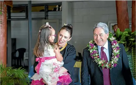  ?? PHOTO: MICHAEL CRAIG/STUFF ?? Prime Minister Jacinda Ardern with her niece, and Deputy Prime Minister Winston Peters in Niue yesterday.