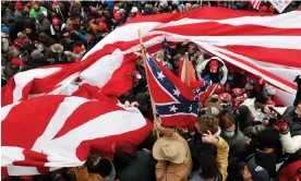  ?? Shannon Stapleton/Reuters ?? US and Confederat­e flags outside the Capitol in Washington on 6 January 2021. Photograph: