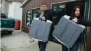  ??  ?? Harri Hursti and Maggie MacAlpine carry voting machines they purchased in Kill Chain. Photograph: HBO