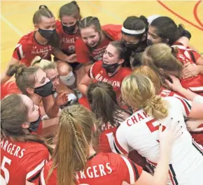  ?? CURT HOGG / NOW NEWS ?? Sussex Hamilton players celebrate on the floor after defeating Burlington to win the Division 1 state title on Saturday night.