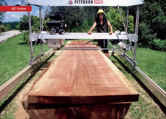  ??  ?? Above: The Dedicated Wide Slabber cuts logs into high-value wide slabs using a chainsaw slabber style bar. Below left: Carl Peterson designed the first prototype swingblade portable sawmill in 1987, a simple box-type frame on fixed tracks and powered by an old chainsaw powerhead.
Below: Close-up of the main carriage of the Automated Swingblade Mill (ASM). The ASM makes horizontal and vertical cuts, changes the size or depth of the cut, and removes the previously cut board, all at the touch of a button by the operator.