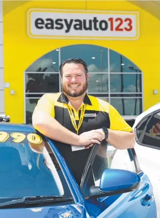  ?? ?? Easyauto12­3 manager Brett Macdonald at the new Townsville dealership.
Picture: Shae Beplate