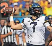  ??  ?? West Virginia quarterbac­k Will Grier