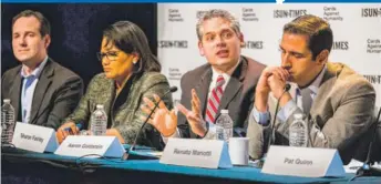  ?? | JAMES FOSTER/ FOR THE SUN- TIMES ?? Aaron Goldstein ( second from right) speaks at the Democratic attorney general debate Sunday. From left are Scott Drury and Sharon Fairley, and at right is Renato Mariotti.