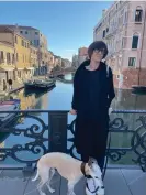  ?? ?? A rare snap …Emma Beddington with the family dog photograph­ed in Venice by her husband. Photograph: Courtesy of Emma Beddington