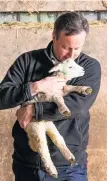  ?? RICHARD
STONEHOUSE/
GETTY ?? David Cameron at Tyfos Farm in Denbighshi­re yesterday ahead of the Welsh Conservati­ve Conference