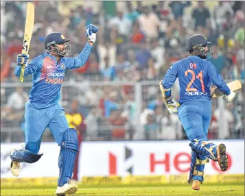  ??  ?? India’s Krunal Pandya and Dinesh Karthik celebrate winning the first T20I match against West Indies at Eden Garden in Kolkata on Sunday