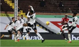  ?? Photograph: Richard Pelham/NMCPool ?? Paul Pogba strikes Manchester United’s stunning winner from distance to see off Fulham’s hopes of a precious point.