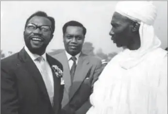  ??  ?? Ben Enwonwu chats with former Prime Minister Sir Abubakar Tafawa Balewa