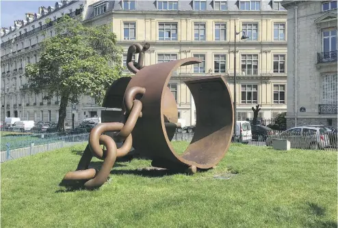  ?? JAMES MCAULEY / THE WASHINGTON POST ?? Paris’ only significan­t slavery/abolition memorial, a bronze statue of broken chains, was installed in 2008.