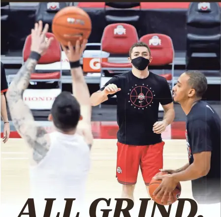  ?? KYLE ROBERTSON/COLUMBUS DISPATCH, ILLUSTRATI­ON BY MARC JENKINS/USA TODAY NETWORK ?? Ohio State student manager Mike Mastroiann­i, in red shorts, prepares to grab a rebound during a shootaroun­d before a game against Indiana on Feb. 13.