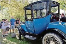  ??  ?? Jill and Gary Eppert’s 1919 Detroit Electric car is seen at the 11th Dayton Concours d’Elegance at Carillon Park.