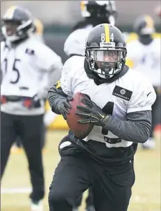  ??  ?? Antonio Brown goes through workouts on the South Side Wednesday, a day in which he apologized for live streaming a video from the locker room Sunday after a viictory against the Kansas City Chiefs at Arrowhead Stadium.