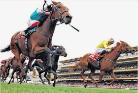  ??  ?? Down to the wire: Sea Of Class (right) just fails to catch Enable in the 2018 Arc