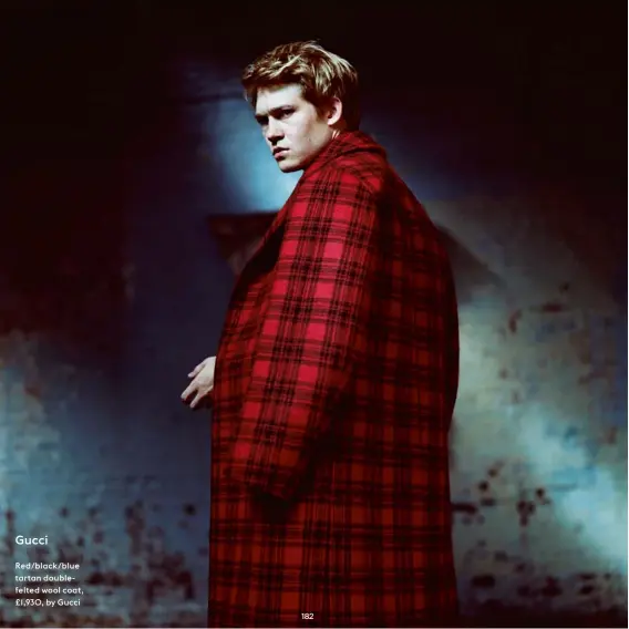  ??  ?? Red/black/blue tartan doublefelt­ed wool coat, £1,930, by Gucci
Gucci