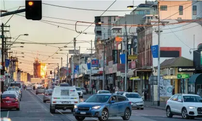  ?? Photograph: Darrian Traynor/Getty Images ?? Business owners in the Sydney Road shopping strip in Brunswick are worried some will hit the wall without government support.