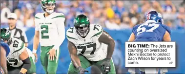  ?? AP ?? BIG TIME: The Jets are counting on oversized Mekhi Becton to protect Zach Wilson for years to come.