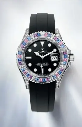  ?? ?? Rolex Oyster Perpetual Yacht-Master 40 in18 ct white gold and a rotatable bezel set with trapeze-cut precious stones