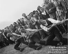  ?? ?? A tug of war during the opening of a sports ground at Elstree, 1949