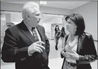  ?? Arkansas Democrat-Gazette/RICK McFARLAND ?? Lily Eskelsen Garcia, president of the National Education Associatio­n, talks with Hall High School Principal Larry Schleicher during a tour of the school Monday. Garcia was in Little Rock in advance of a speech Monday night at the University of...