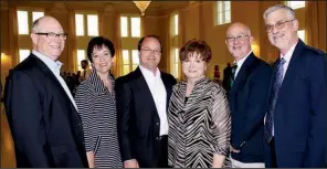  ??  ?? Kirk and Laurie Netherton of Conway; Joe Madden; board chairman Christine Donahue, also of Conway; and board members Steve Bullock and Shawn McMurry