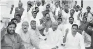  ?? — PTI ?? BJP MPs sit on a dharna against the UP government over various issues in Lucknow on Monday.