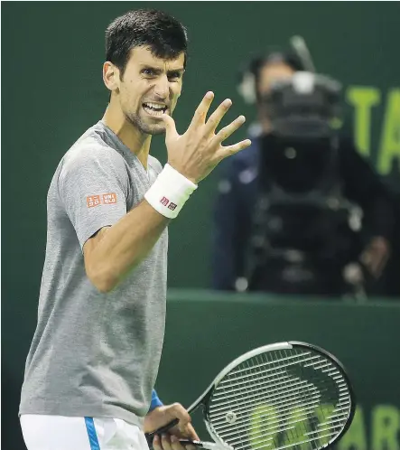  ?? — GETTY IMAGES ?? Novak Djokovic reacts after winning a point against Andy Murray during the men’s singles final match of the ATP Qatar Open in Doha on Saturday.