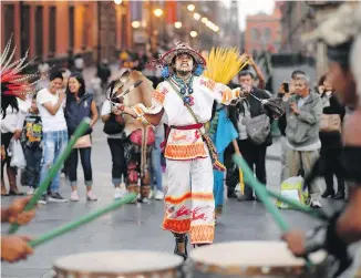  ??  ?? Aztec performer in Zocalo, the common name for the main square in Mexico City.