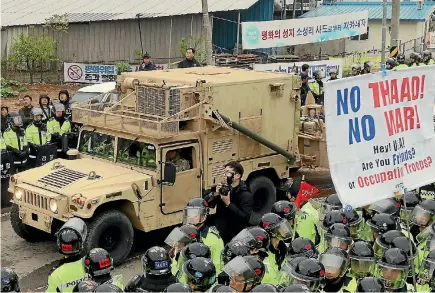  ?? PHOTO: REUTERS ?? An American military vehicle which is a part of the Terminal High Altitude Area Defence (THAAD) system arrives in Seongju, South Korea.