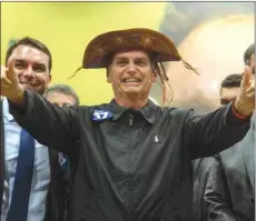  ??  ?? Brazil’s right-wing presidenti­al candidate for the Social Liberal Party Jair Bolsonaro gestures at a press conference in Rio de Janeiro.